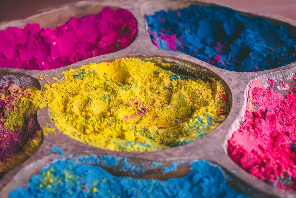 Bowls of coloured powder