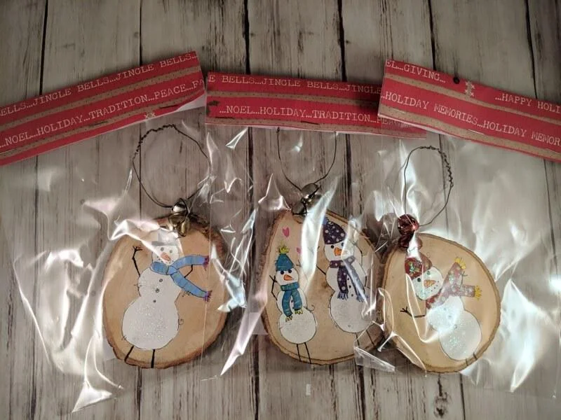 woodornamentsLarge_snowmen_all1_9dfb89fe-53f0-4c91-b123-ee652eff344f.jpg