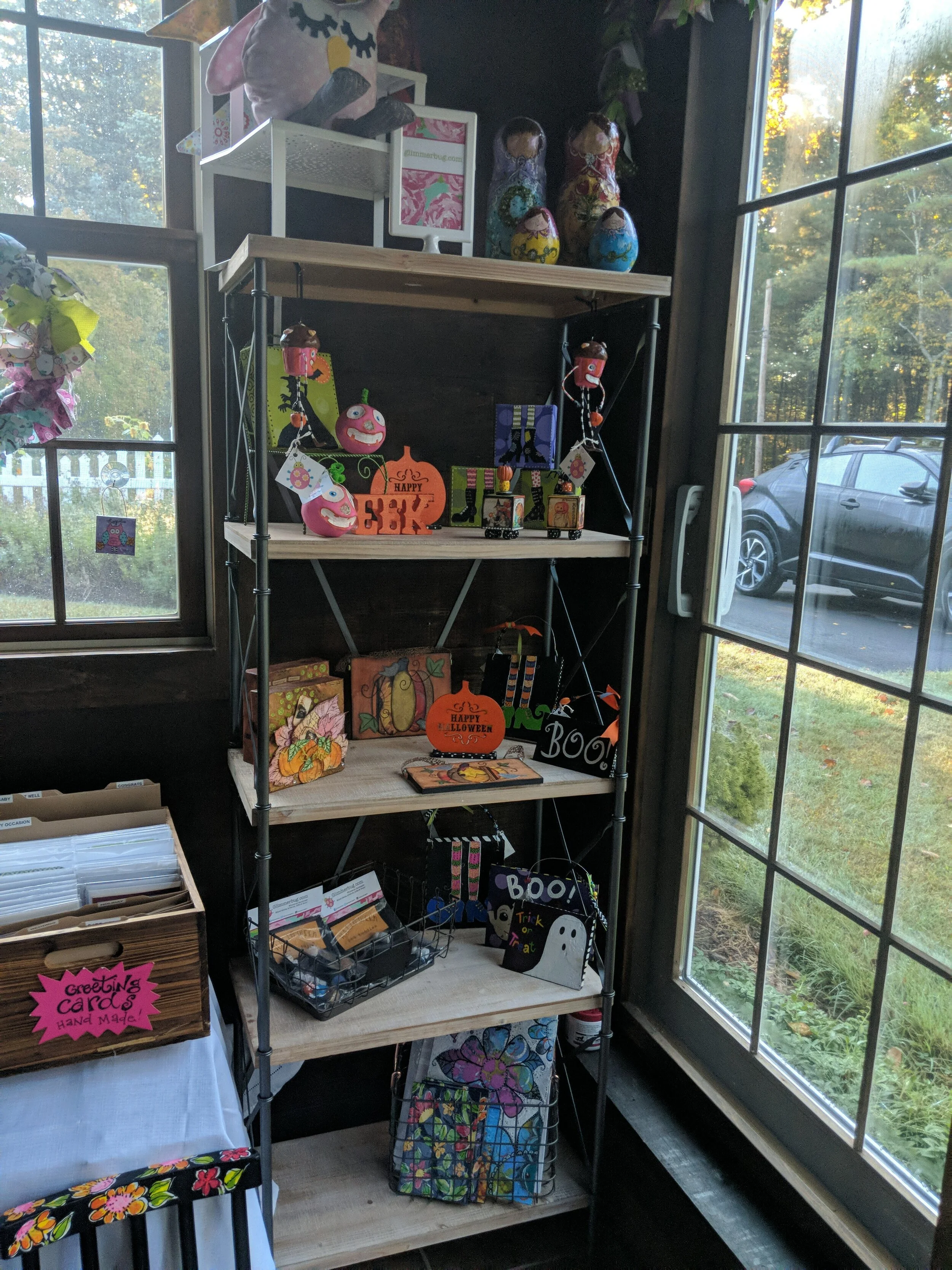 I bought the cutest shelf at Home Goods and set it up in my shop to feature seasonal pieces, like Halloween and Fall.