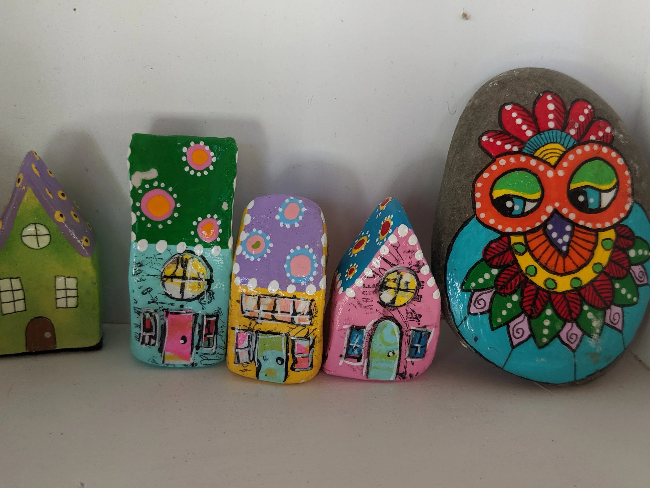 Painted rocks and whimsical clay houses are displayed in the case inside my shop with eye catching color and fun little details. These were a big hit with the kids that visited the shop during the Bolton Harvard Open Studios.