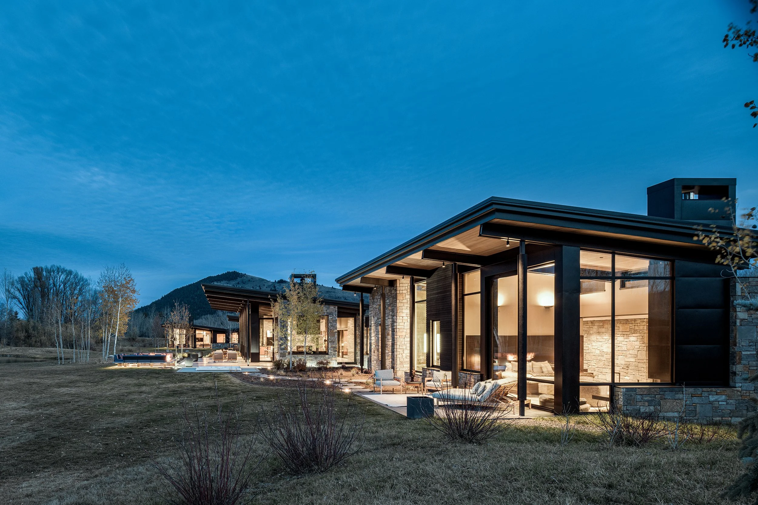 Ward_Blake_Architects_ChaCh_Residence_Exterior_Patios_Night_Sho_Sugi_Ban_Concrete_Stone_Steel_Mountain_Views.jpg