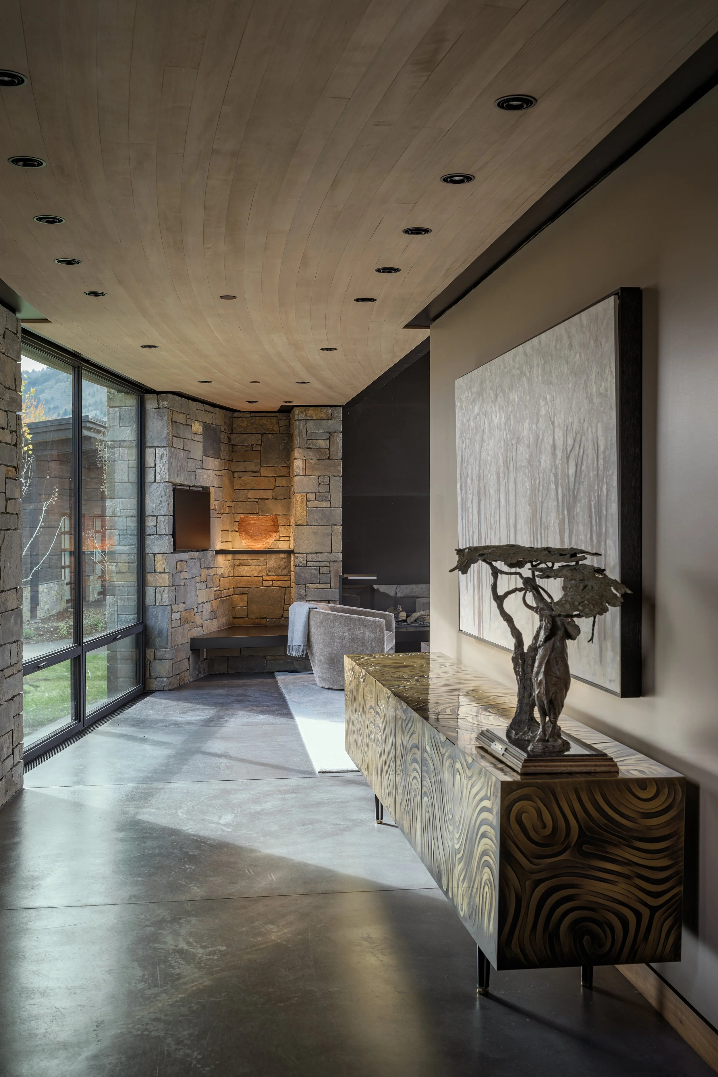 Ward_Blake_Architects_ChaChe_Resdience_Primary_Bedroom_Hallway_Stone_Concrete_Mountain_Views.jpg