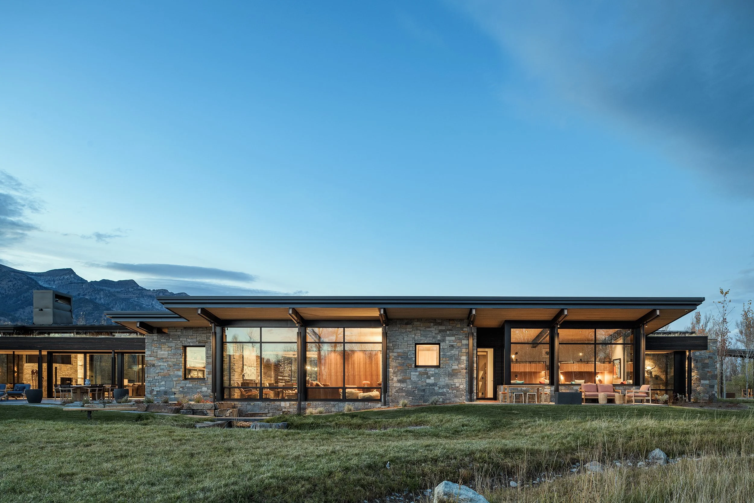 Ward_Blake_Architects_ChaChe_Residence_Exterior_Back_Elevation_View_Patio_Stone_Concrete_Mountain_Views.jpg