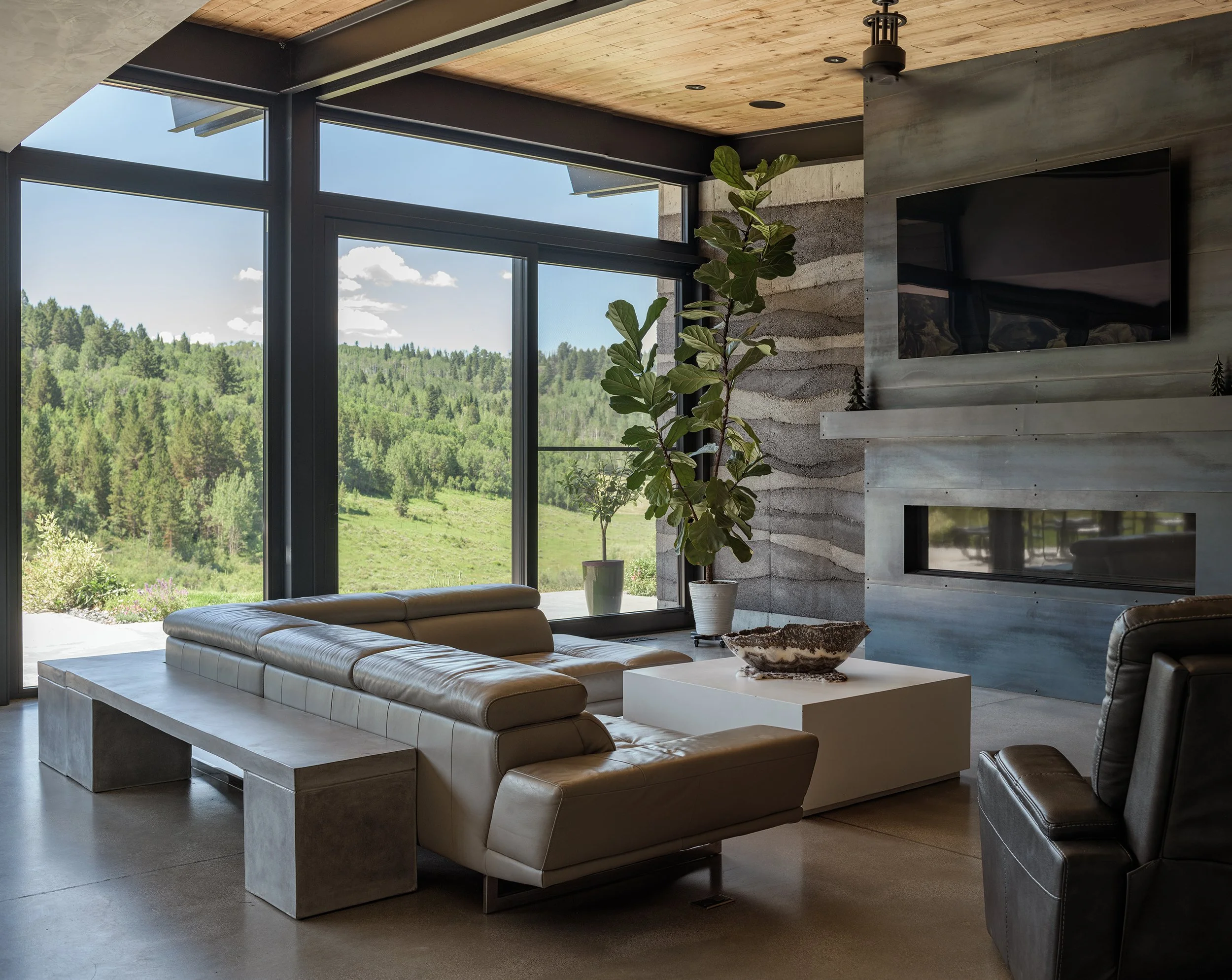 Ward_Blake_Architects_Freedom_Residence_Interior_Living_Room_Fireplace_Mountain_Views_Rammed_Earth_Walls.jpg