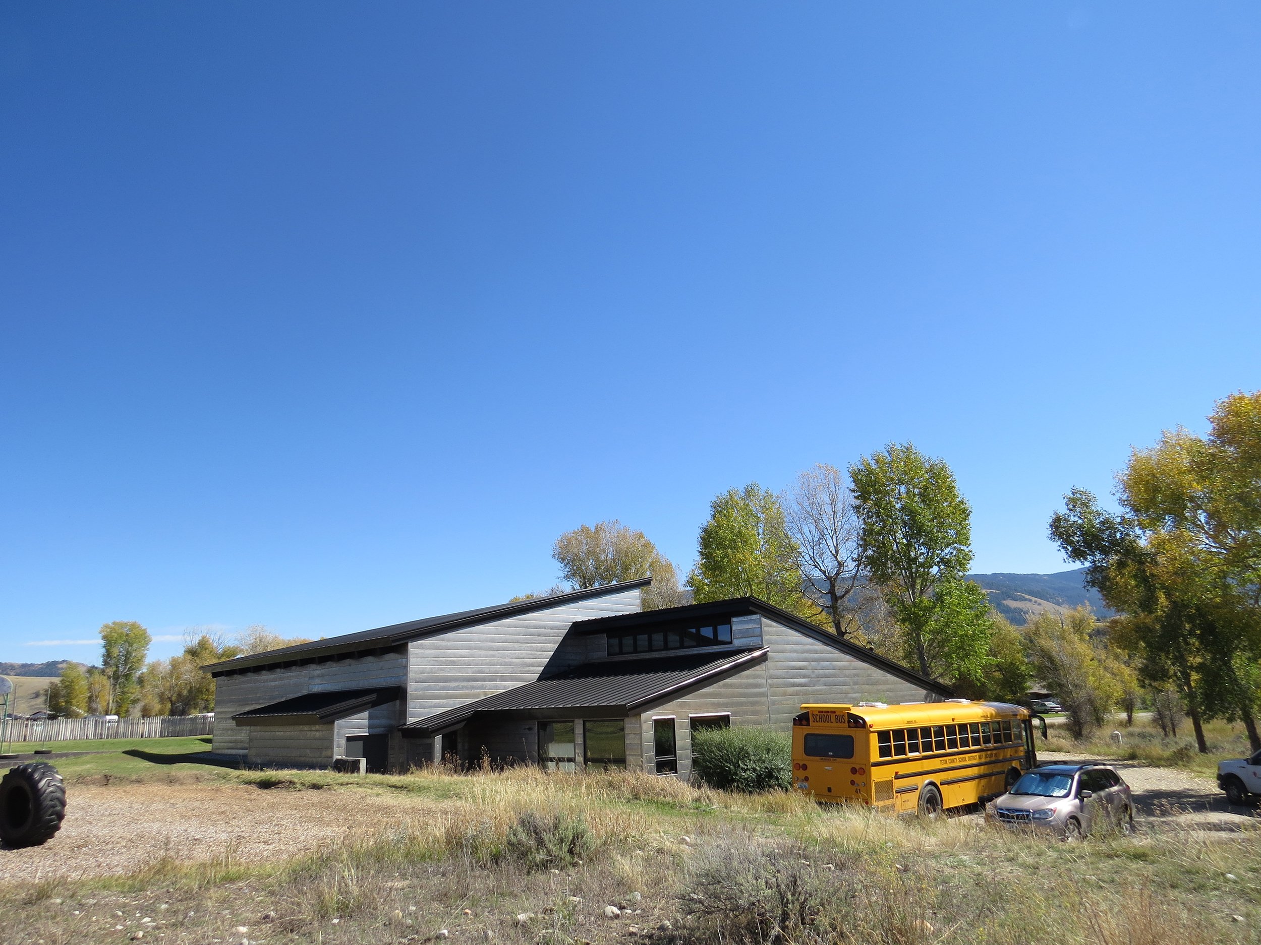 Ward_Blake_Architects_Kelly_School_Renovation_Exterior_Back_Elevation_With_Bus.jpg