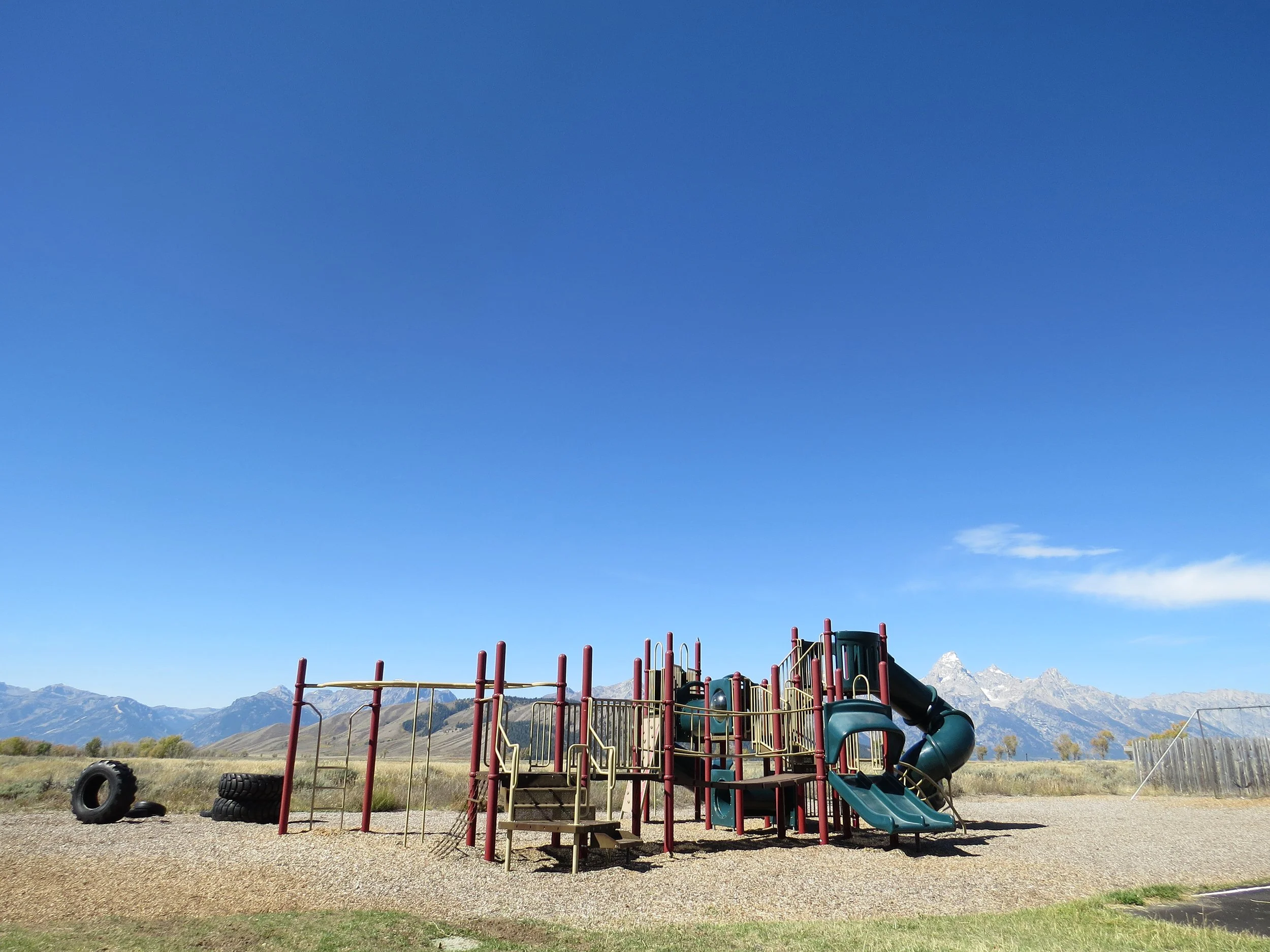 Ward_Blake_Architects_Kelly_School_Renovation_Exterior_PLayground_Area_with_Grand_Tetons_in_Background.jpg