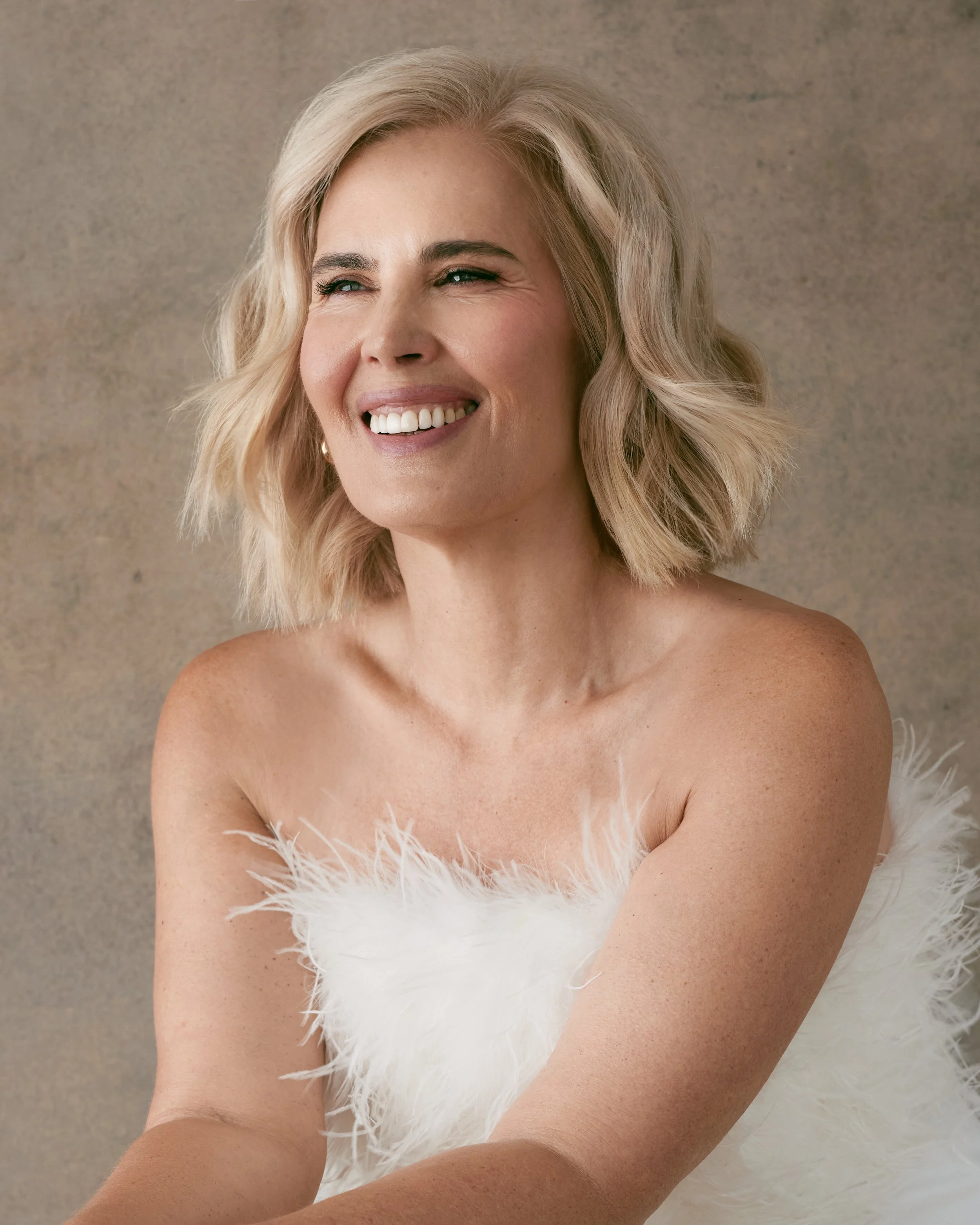 magazine-portrait-laughing-white-feathers-nyc.jpg