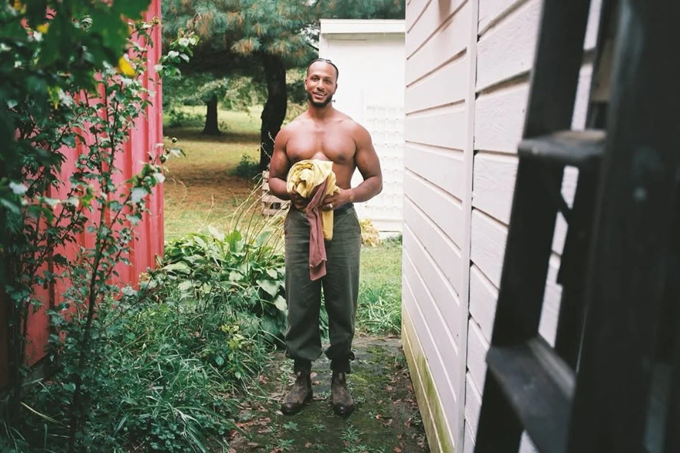 Wesley T. Brown standing in a garden path in the Hudson Valley