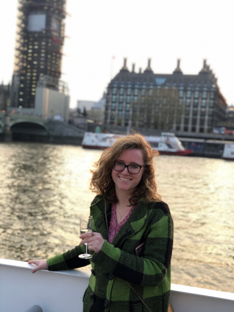 Hi, I’m Molly! I always get phrases wrong, I love listening to Sia, and I have terrible luck when traveling, but I can do a mean Christopher Walken impression and apparently when I laugh at myself I sound rich! This photo is from a time when I was drunk and happy in London! 🍷