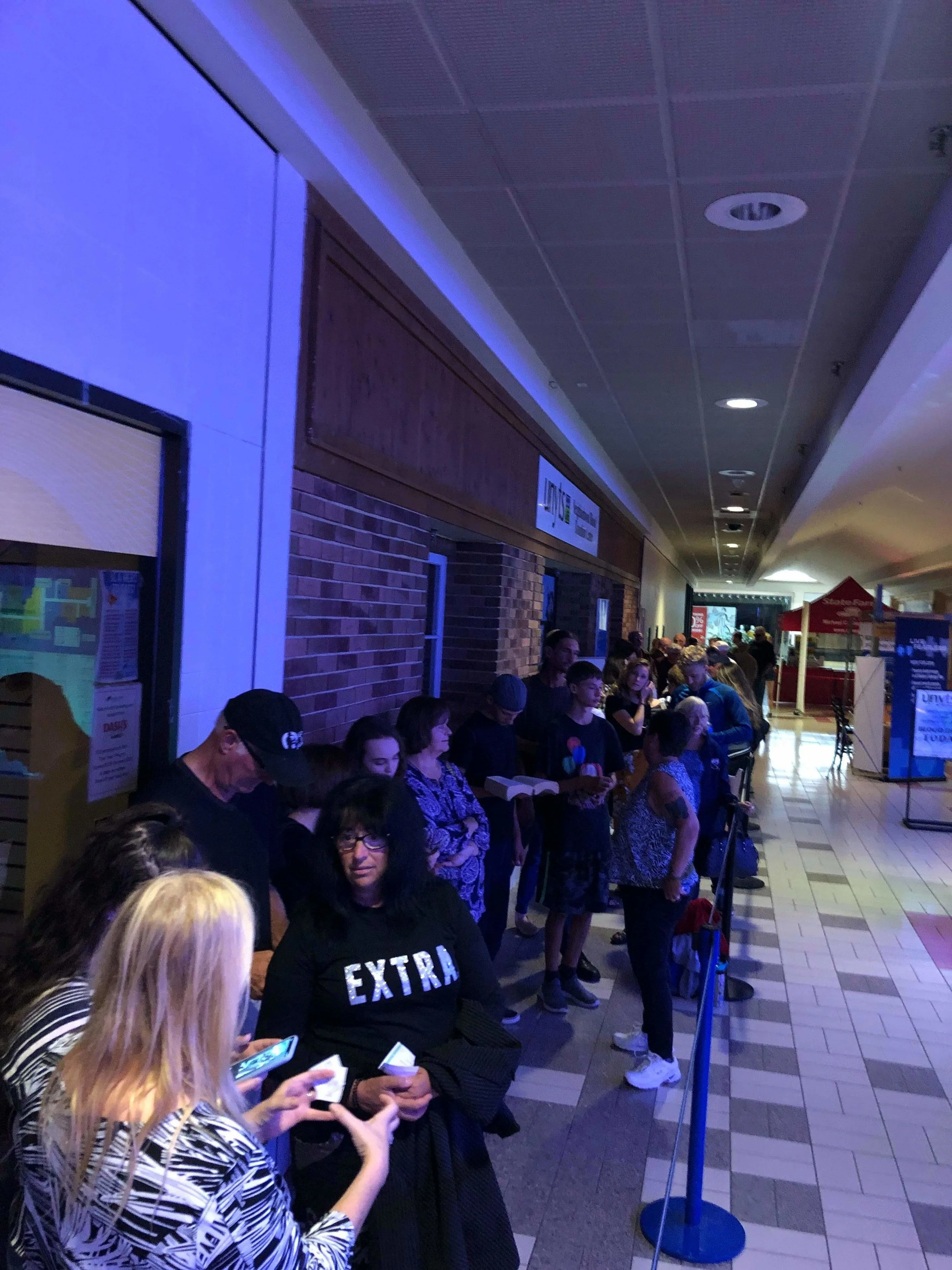 The ticket holders’ line outside the theater stretching down into the mall!