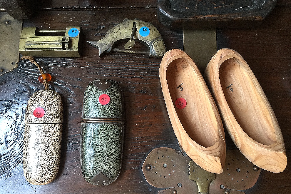 (35) Brass lock (36) Fish shaped brass locks (41) Glasses case made of sharkskin and decorated with amber jewelry (42) Glasses case made of sharkskin (37) Clogs