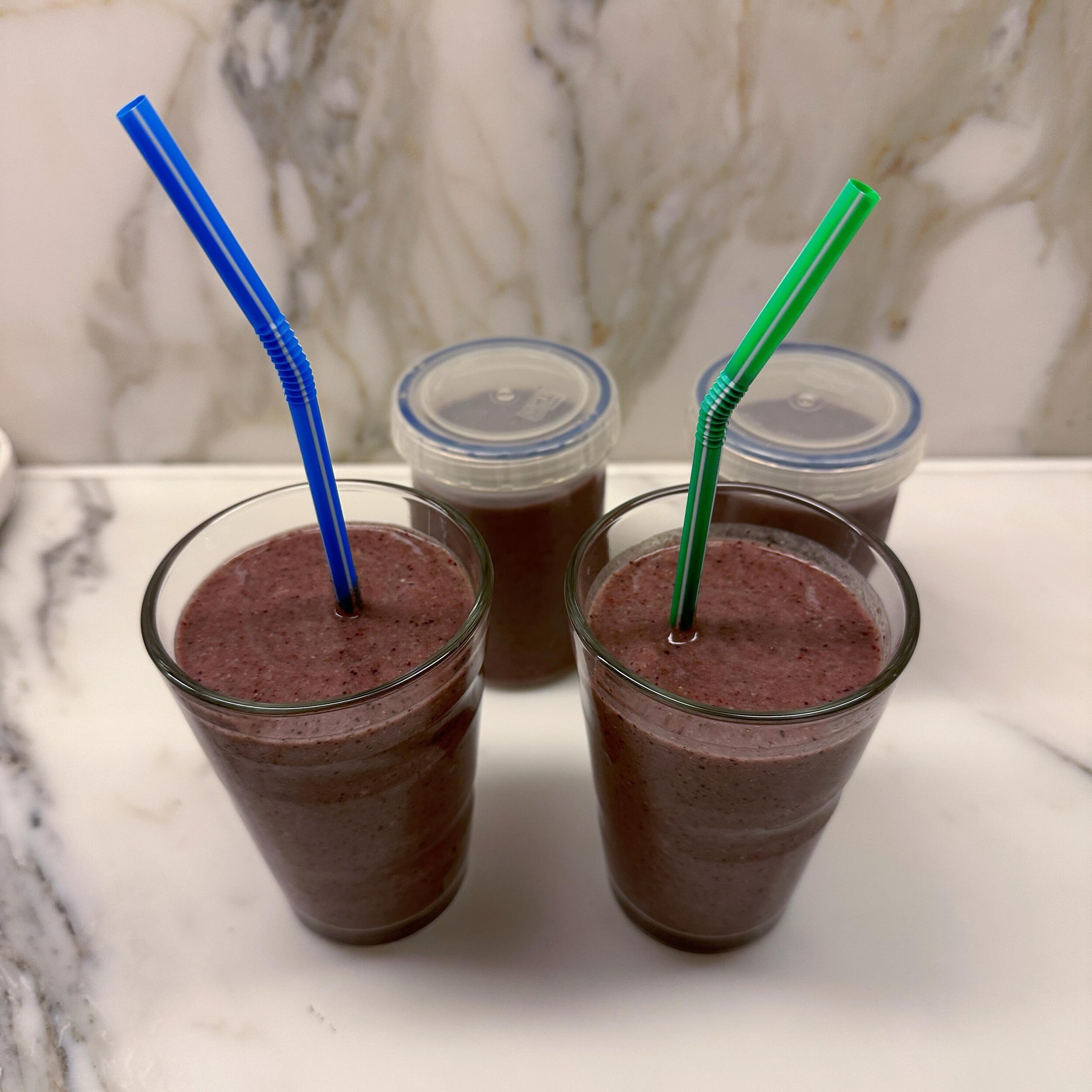 Mid-morning smoothie, with the afternoon pick me up ready. What&rsquo;s in this one? Frozen organic avocado, spinach, banana, wild blueberries, ginger, 3 tbsps of @harmlessharvest organic cultured coconut yoghurt, 3 tbsps ground organic flaxseed, 1 t