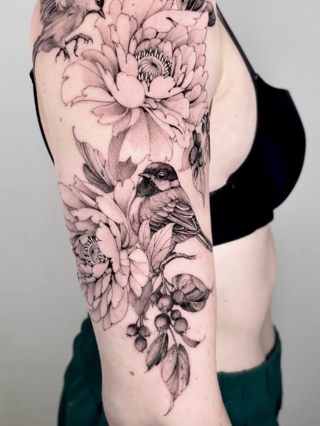 Fine line floral tattoo artist Jim Tran, based in Calgary at 9 Element Tattoos.