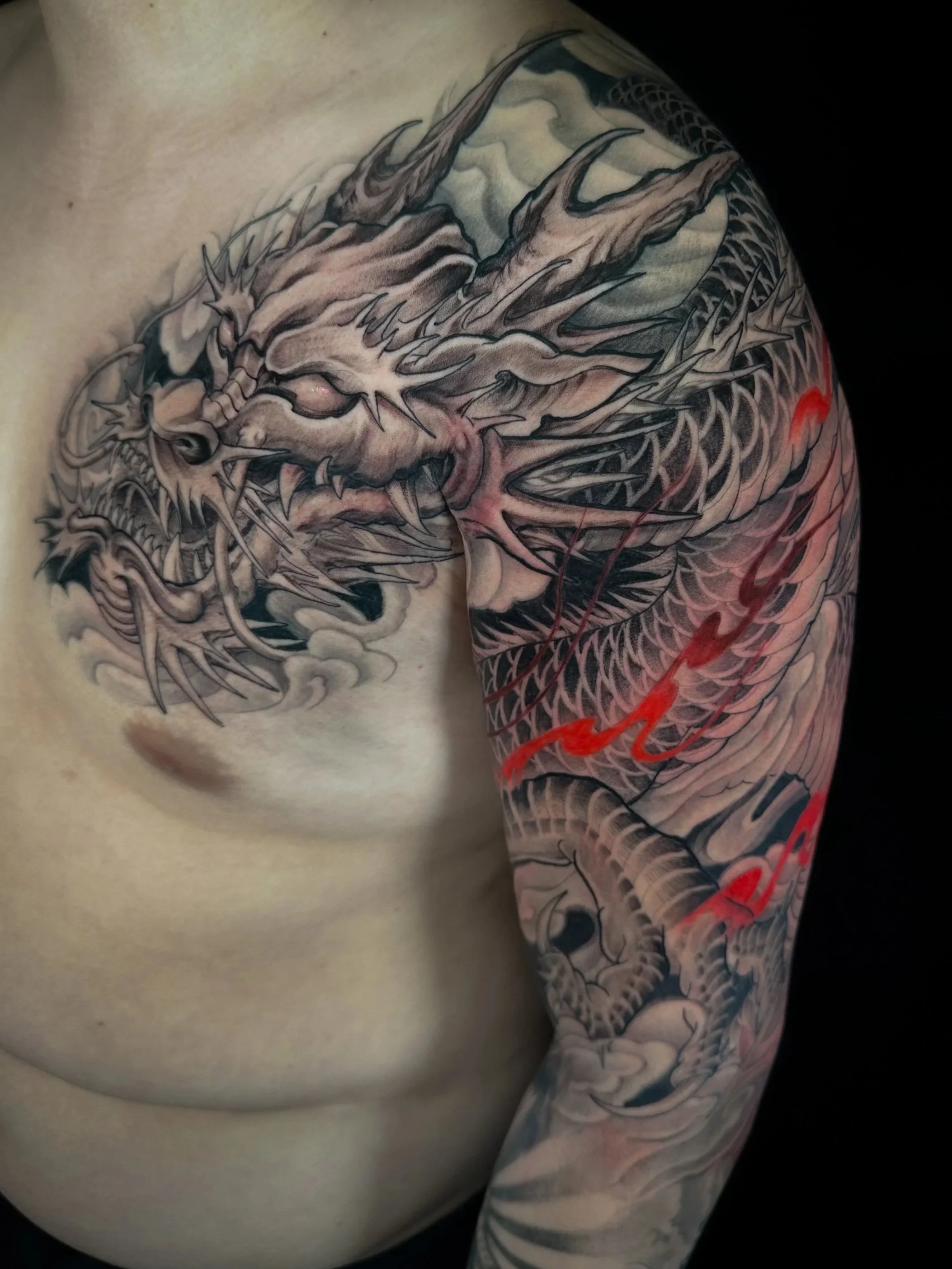 Black and grey Japanese-inspired tattoo by Calgary artist Vince Lau at 9 Element Tattoos