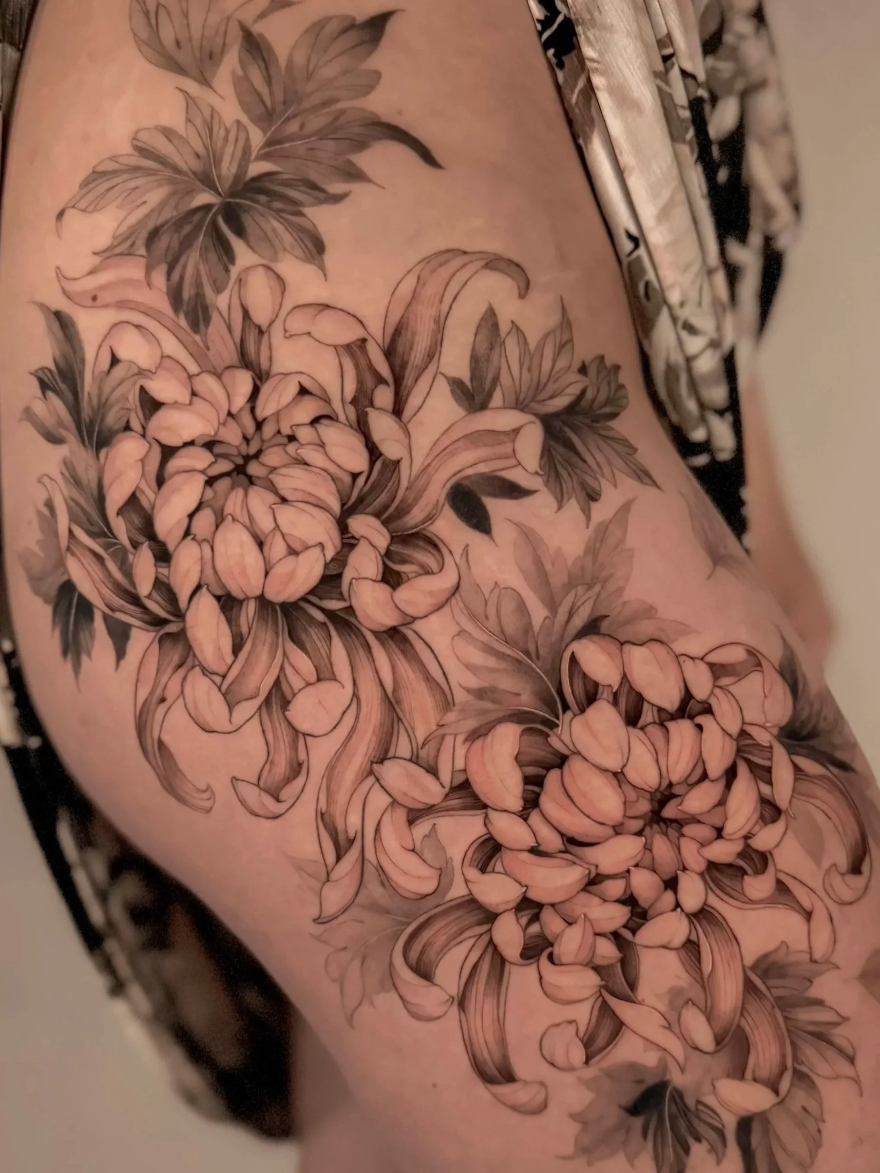 Fine line floral tattoos by Calgary artist Michelle Luong at 9 Element Tattoos