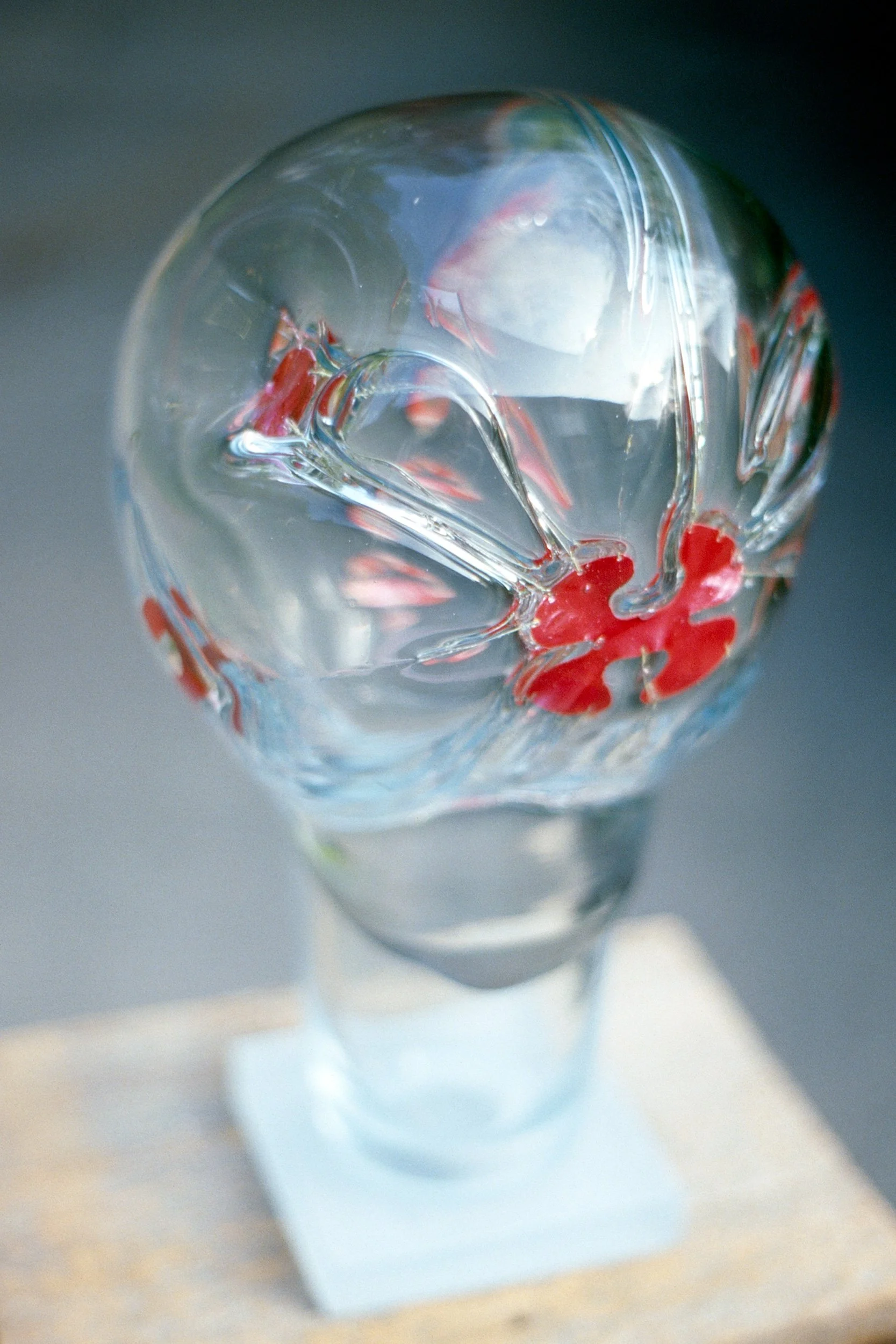 DAS0418-Don-Shepherd-artist-designer-glass-encased-metal-heads-sculpture-Transitional-Head-1981.jpg
