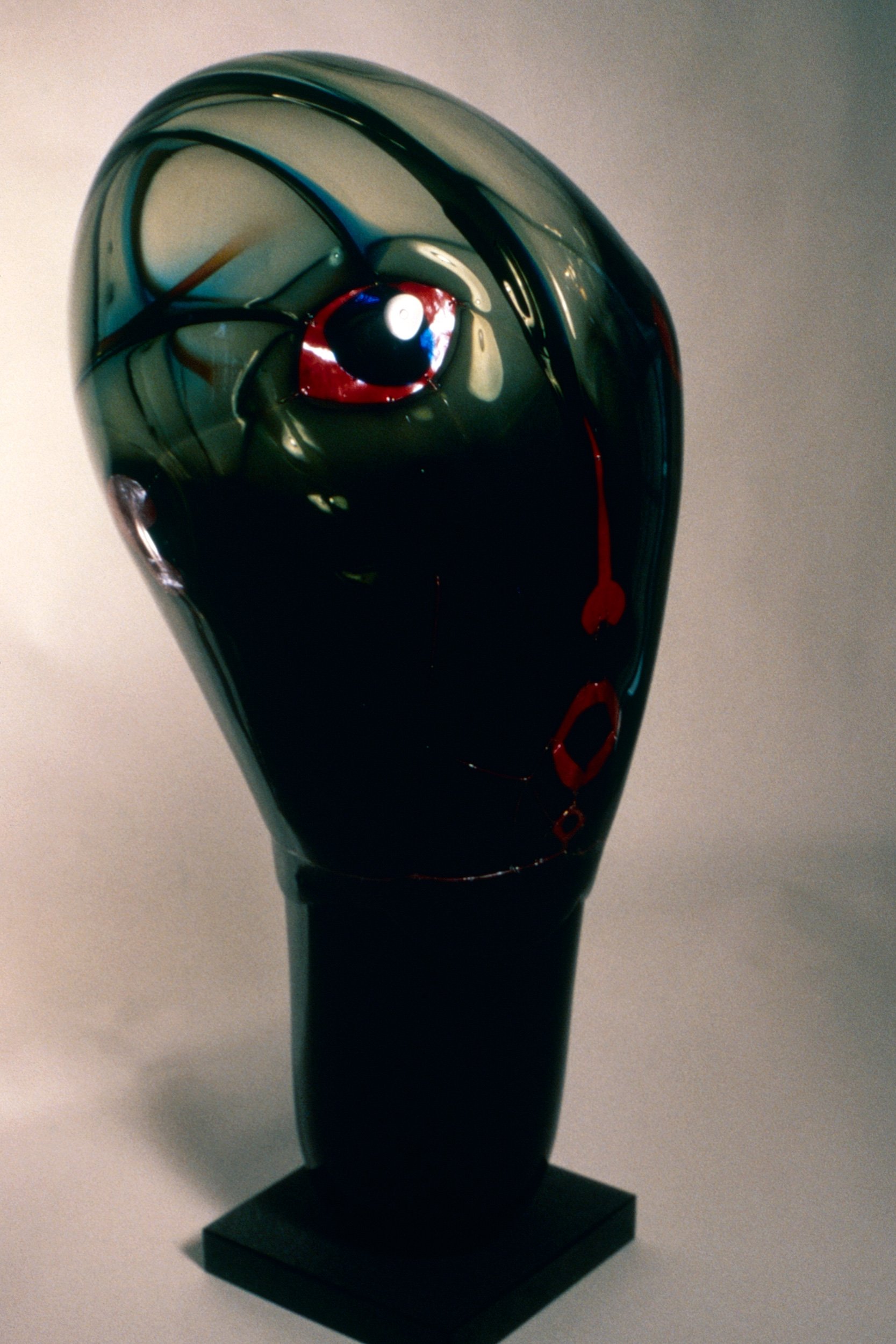 DAS0427-Don-Shepherd-artist-designer-glass-encased-metal-heads-sculpture-Transcending-Head-1982.jpg