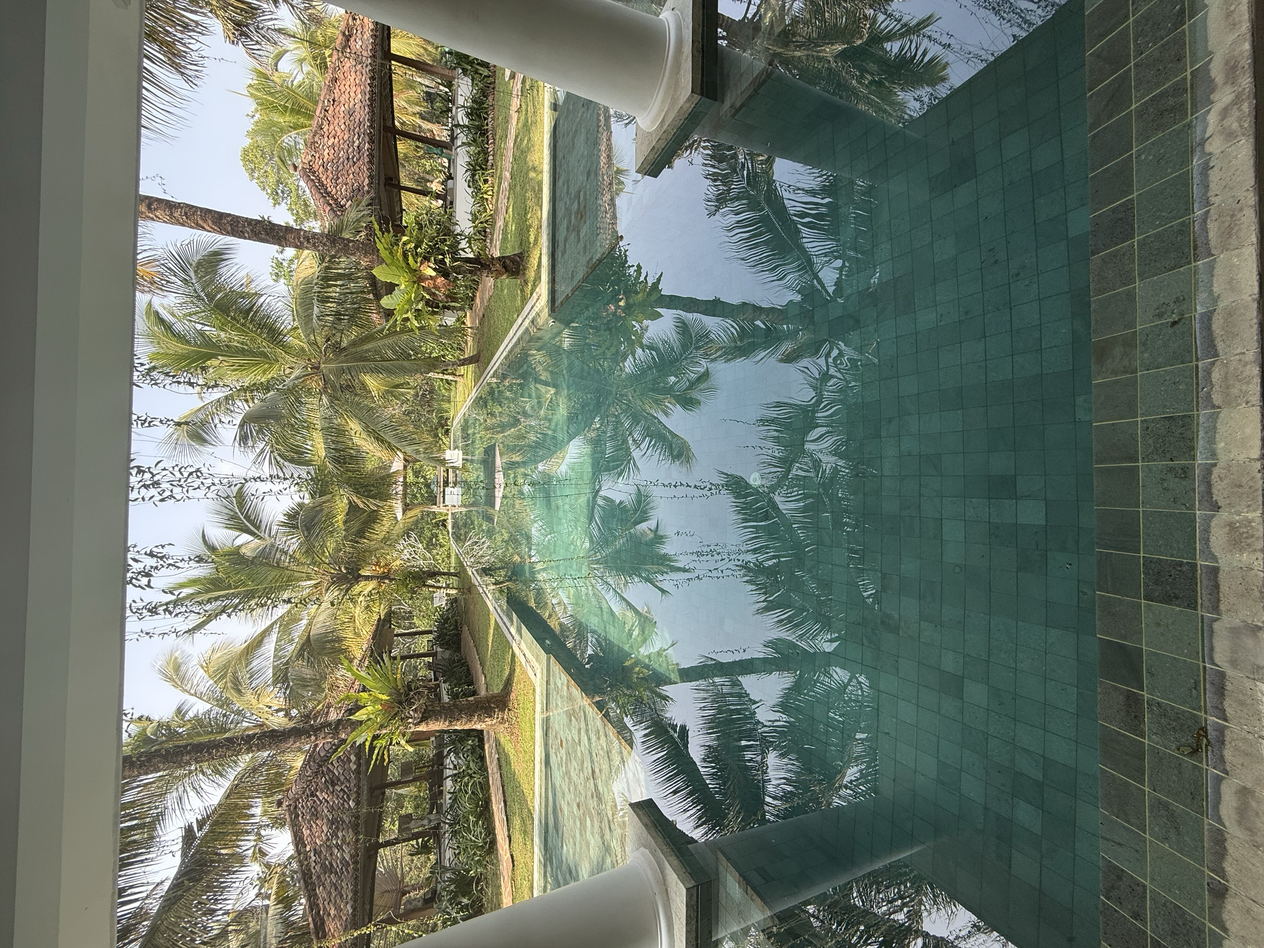 Swimming pool at Villa Nibana, where guests can relax between yoga, breathwork and time by the sea.