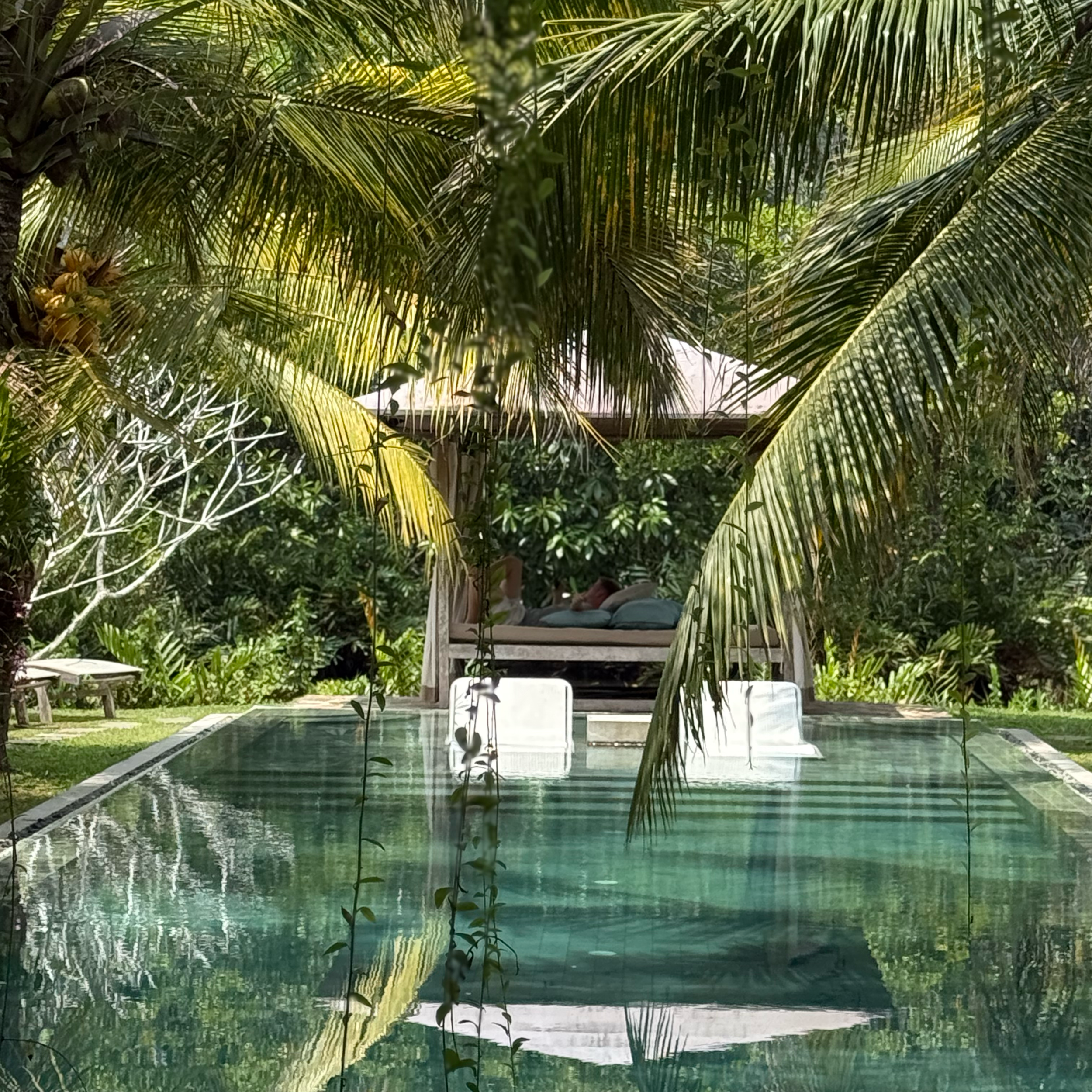 The tranquil pool and pavilion at Villa Nibana, where guests can slow down and unwind.