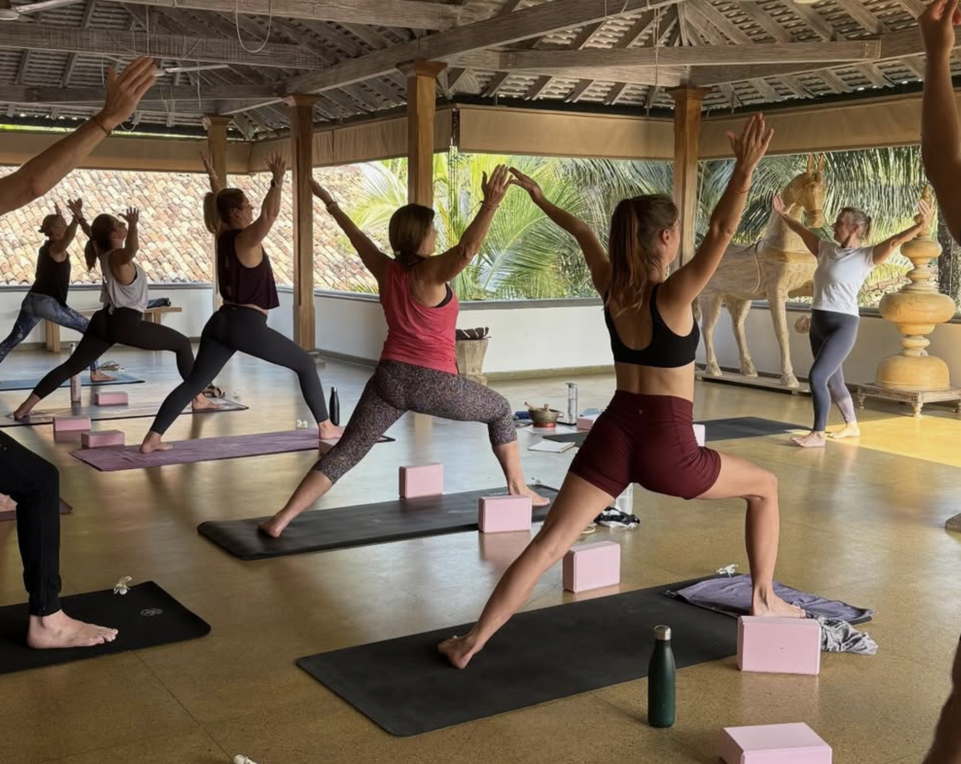 Daily morning yoga practice in the open-air shala during the Sri Lanka retreat.