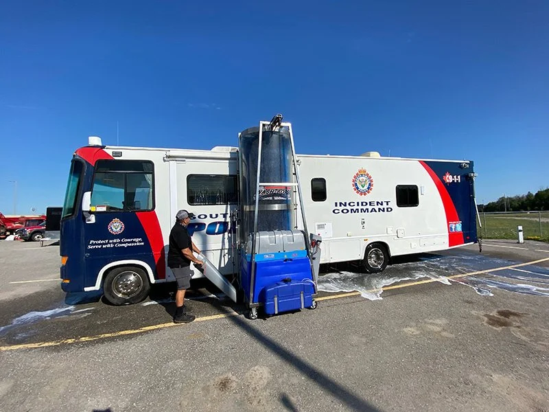 First Responder vehicle being washed by a washbot machine