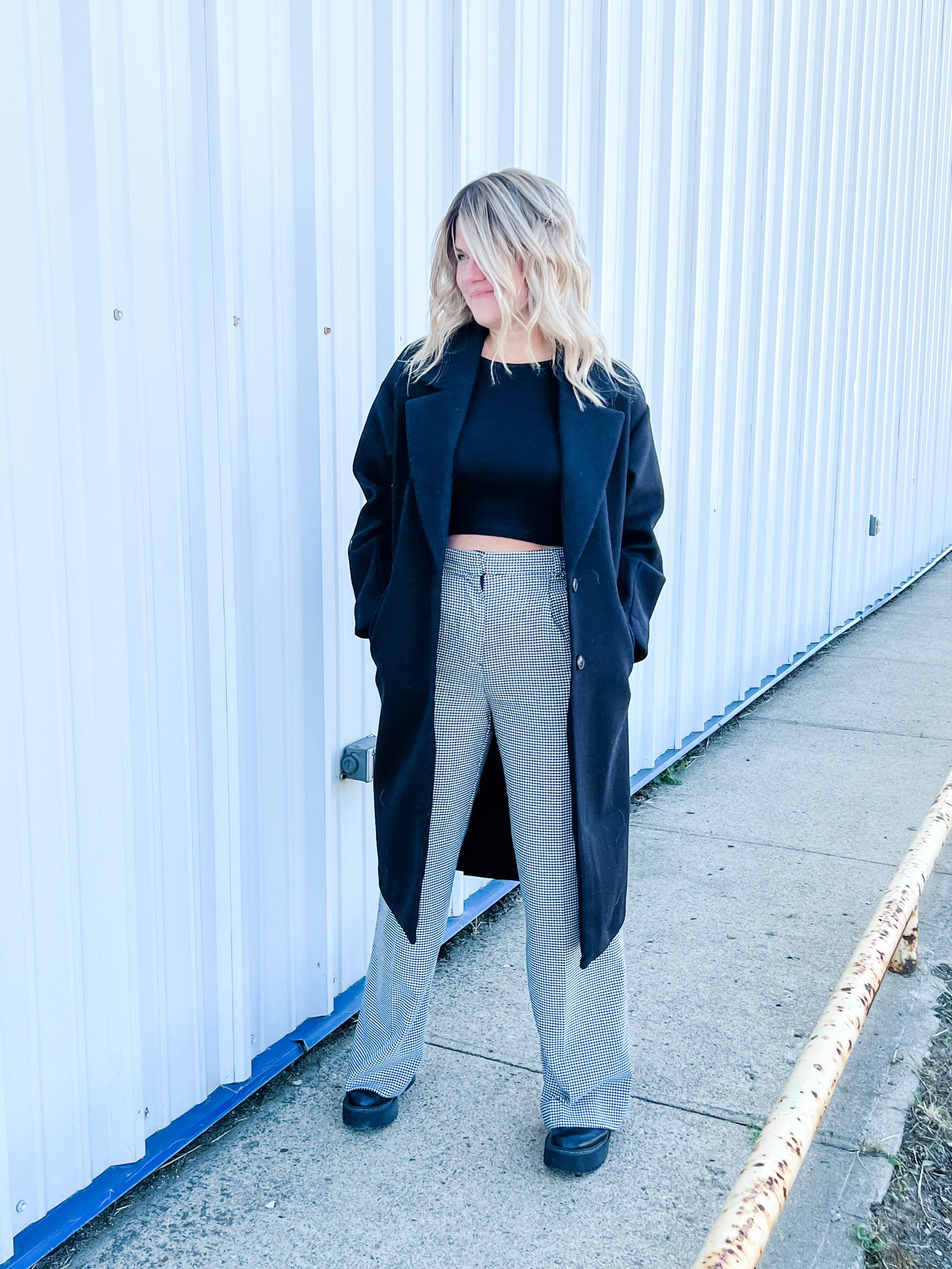 WIDE-LEG TROUSERS PAIRED WITH COMBAT BOOTS