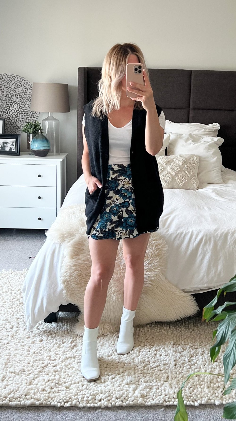 UNBUTTONED BLACK OVERSIZED SWEATER VEST  + FLORAL SKIRT + WHITE TEE + WHITE ANKLE BOOTS 