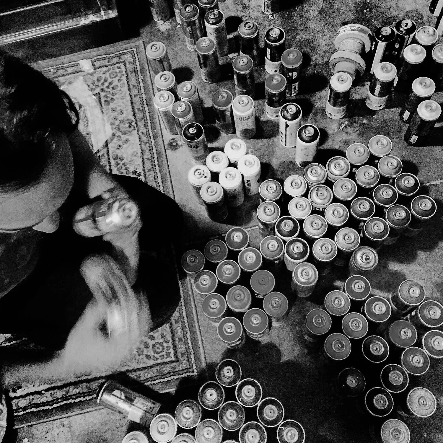 Harvey Jackson preparing spray cans