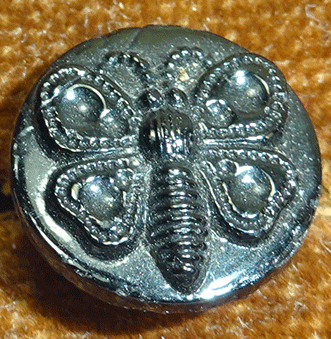 Tiny black glass butterfly