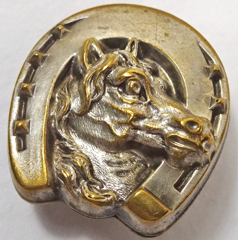 Horse's head in horse shoe, stud shank