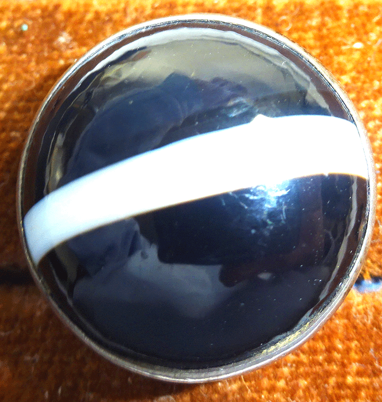 Black and white stud button