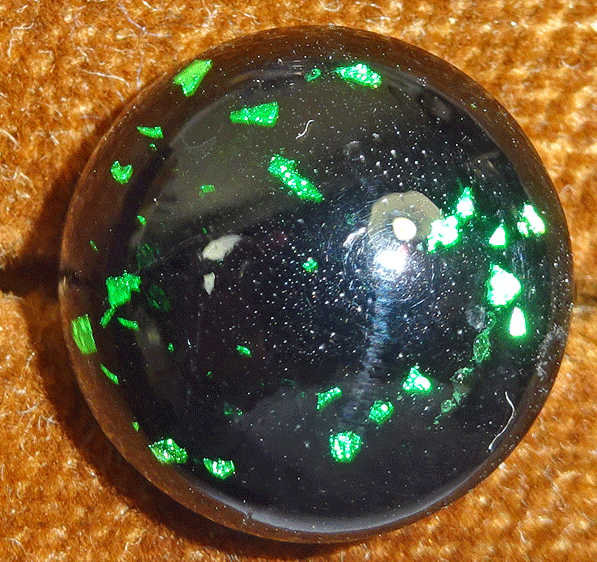 Green speckled waistcoat button