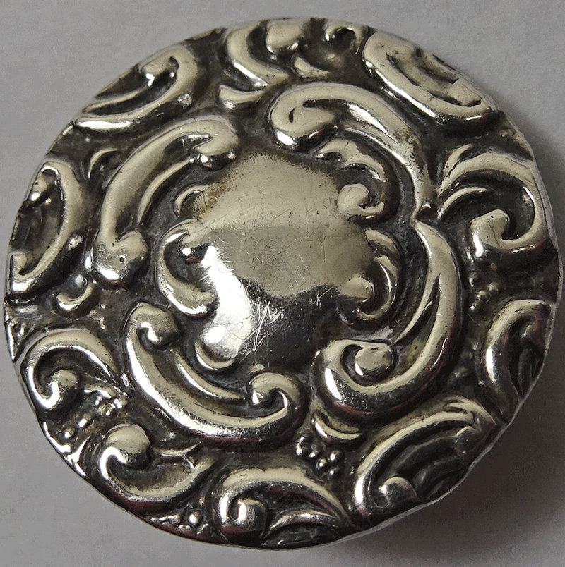 Early raised silver over bone back