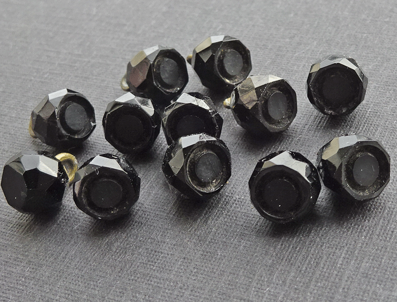 Set of 12 very small black glass buttons