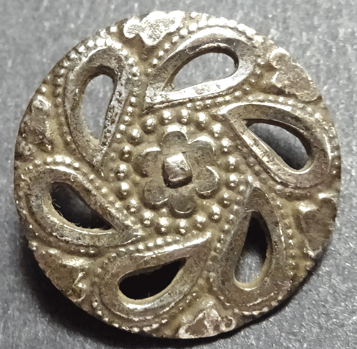 Pressed and pierced flat steel button
