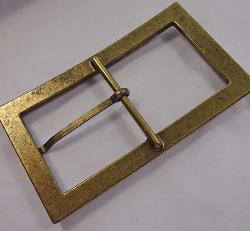 Large brass buckle inlaid with pastes 