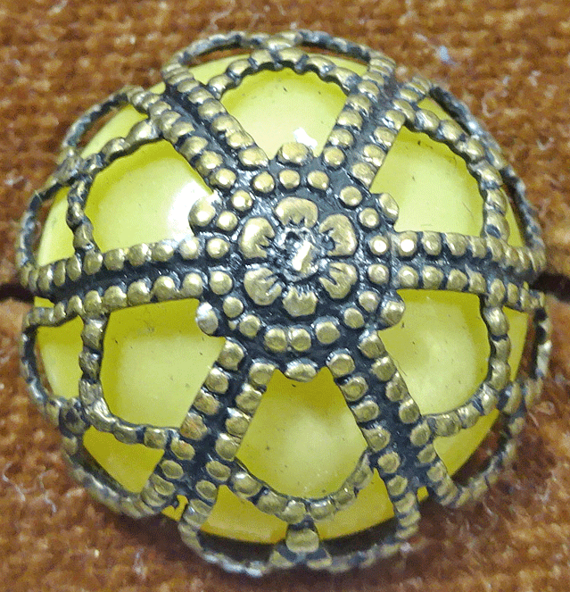ng357-yellow-glass-in-metal-cage.gif