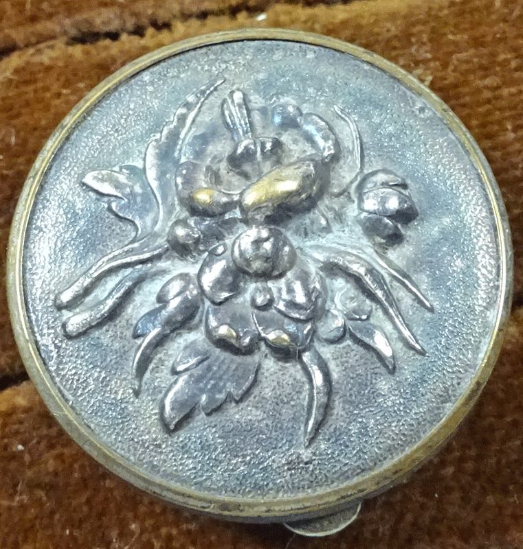 Wests Patent solitaire with silver plated flowers