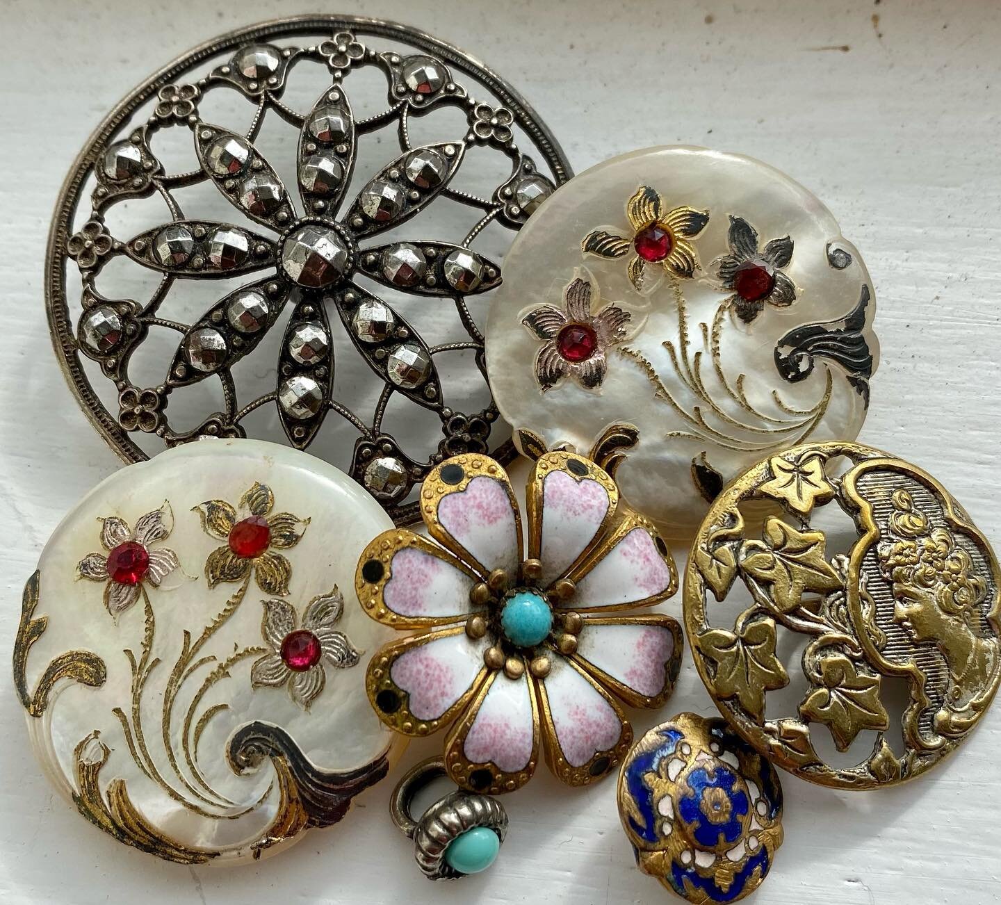 Some more lovely old buttons added to website today #antiquebuttons #antiquemotherofpearl #enamelbuttons #www.vintagebuttonemporium.com