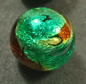 Small green and copper foiled glass ball buttons