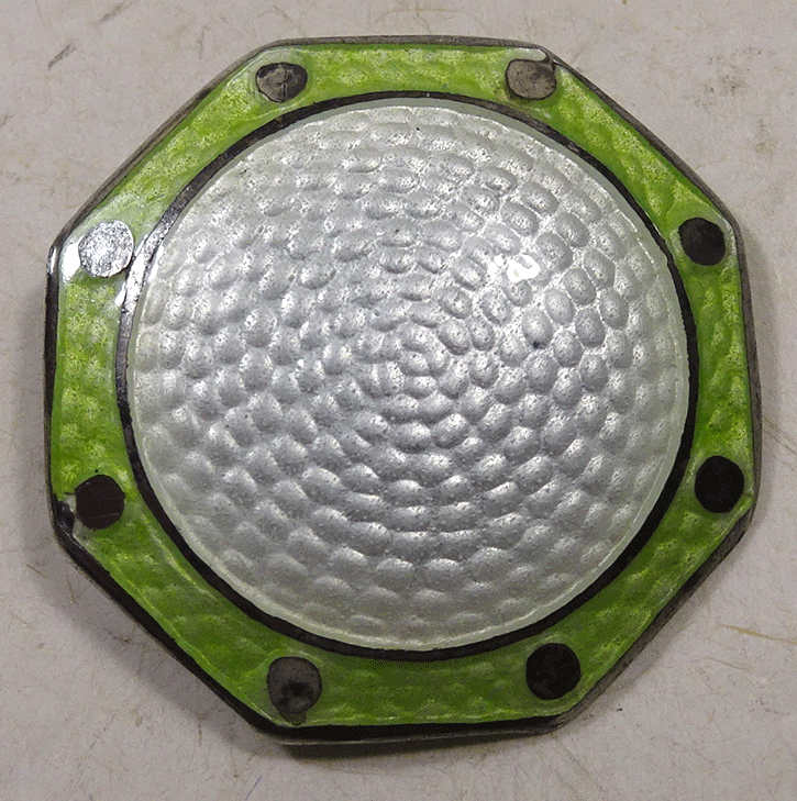 Green and white enamel on silver