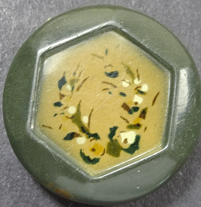 Stencilled flowers on celluloid