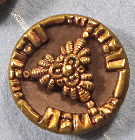 na694-gold-motif-on-brown.gif