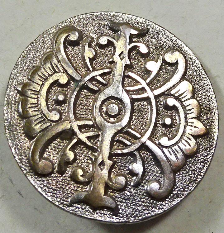 nd736b-pressed-white-metal.gif