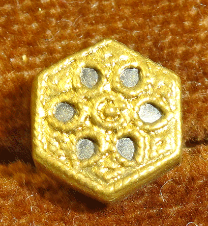 Small pierced brass hexagon