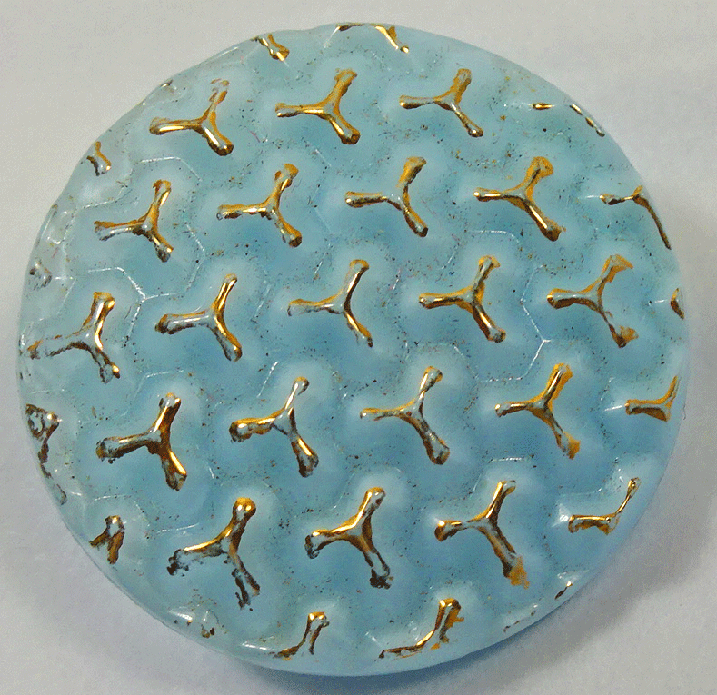 Smocking pattern on turquoise glass