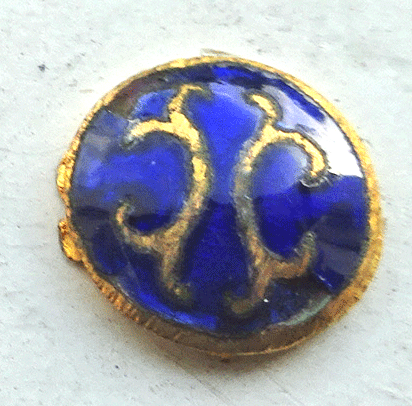 Tiny blue enamel buttons