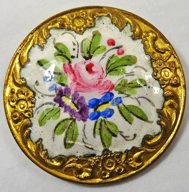 Flowers on white enamel with gilt metal border