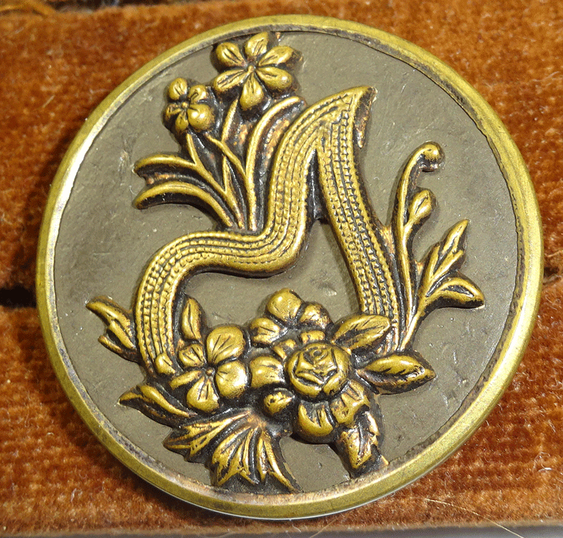 Victorian flower button with ribbon harp