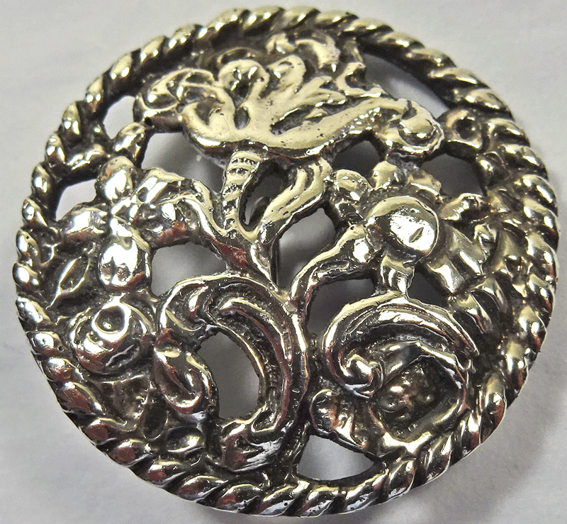 Molded flowers, possibly silver